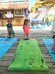 Kids need yoga and mindfulness in our world today. My Daughter Enjoyed A Kids Yoga And Art Class On Adventure Pier Globetrotting Mommy