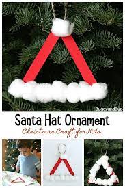 Grab some baker's twine and clothespins to make this adorable, easy holiday decoration. Santa Hat Homemade Christmas Ornament Using Craft Sticks Kids Christmas Ornaments Christmas Ornaments Christmas Ornaments Homemade