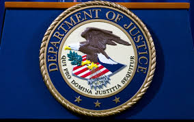 Justice Department reveals settlement with Trump 2016 campaign aide over Russia probe surveillance