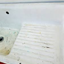 To remove the stains with nail polish remover, rubbing alcohol, or hydrogen peroxide, apply one of the solutions onto a couple of cotton balls and rub the stains away. How To Clean Paint Off A Porcelain Sink Clever Housewife