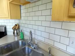 Subway tile backsplash installation | how to grout, caulk, and seal! Painted Subway Tile Backsplash Remodelaholic Diy Kitchen Backsplash Subway Tile Backsplash Faux Tiles