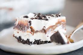 After a few hours in the fridge, it's ready to cut and devour. No Bake Heavenly Oreo Dessert Brown Eyed Baker