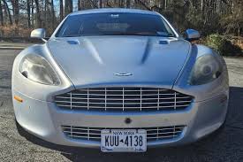 Image result for Lightning Silver 2011 Aston Martin