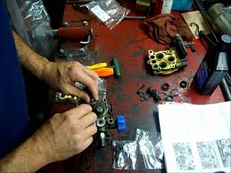 Replace the pump check valves or replace the entire pump if it doesn't build up adequate spray pressure. Pressure Washer Repair Resealing The Pump Youtube
