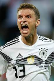 Germany S Forward Thomas Mueller Celebrates After Winning At The End Thomas Muller Germany Football Team Germany Team