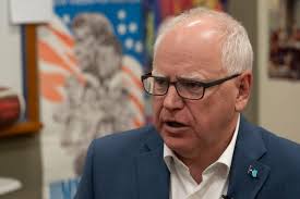 In Iowa, Tim Walz says Democrats demand leaders 'do something, dammit'