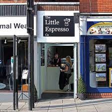 Make Mine A Skinny Cappuccino Welcome To The World S Smallest Coffee Shop That Measures Just 5ft Across And Doesn T Even Have A Table Small Coffee Shop Coffee Shop Cafe Shop Design