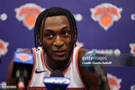 Immanuel Quickley of the New York Knicks speaks at a press conference...  News Photo