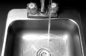 how do i remove a kitchen sink flange