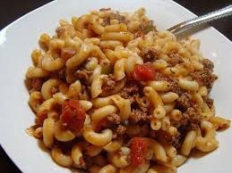 Johnny Marzetti 1 Pound Ground Chuck 1 Onion Diced 1 Green Pepper Diced 1 Teaspoon Oil 1 Large Can T Johnny Marzetti Cafeteria Food School Lunch Recipes