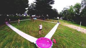 Slip N Slide Kickball Must Be Your Next Summer Activity Go Sports Tourism Blog Summer Activities Slip N Slide Kickball Camping Games