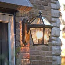 With scott as my hand model, we'll show you how to install an exterior light. Lantern 8 In Wide Curved Arm Exterior Wall Light Brass Light Gallery Milwaukee Wisconsin 53233