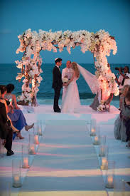 Beach weddings can be absolutely beautiful, having the natural beauty of the ocean and the beach be the background to a romantic, tropical ceremony. Sunset Beach Wedding At The Banyan Tree Mayakoba Destination Wedding Details