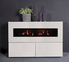 Three sided electric fireplace shown with mantel surround. Electric Fireplace Concept 6 Kamin Design Gmbh Co Kg Ingolstadt Contemporary Closed Hearth Floor Mounted