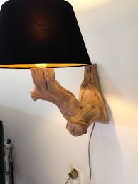 A large and bold floor lamp of a tree branch, a stylish stone base and a fabric lampshade for a natural touch. Unique Wooden Floor Lamp Cloth Cable Old Branch With Lampshade Lighting Home Living
