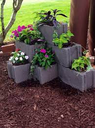 These inexpensive and reliable materials can be also utilized for many home and garden diy projects. Cinder Block Planter Cinder Block Garden Front Yard Landscaping Backyard Landscaping