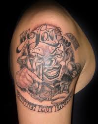 Reminiscent of a film negative, with an image of whites, grays, and blues on a black background, you have this style of tattoo. Gangster Cartoon Character Tattoos Novocom Top