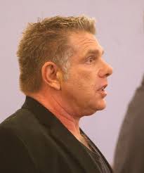 Man charged with hiring someone to kill son to stand trial