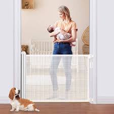 Kinbor Baby Retractable Baby Gate Extra Wide Safety Gate And Pet Gate For Stairs Doors And More Mesh Baby Gate With Easy Latch And Flexible Design Fits Most Spaces Buy Online In