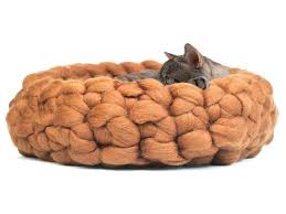This cat bed is similar but the difference is that it's not crocheted but knitted. Chunky Brown Yellow Woolen Round Bed For Cats Handcrafted Cozy Furniture Bure Bure Wool Slippers