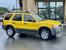 Image result for Chrome Yellow 2003 Escape