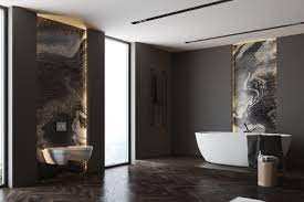 Modern bathroom features a floating marble vanity fitted with his and her sinks and gold faucets under mirrored medicine cabinets illuminated by white. 20 Black Marble Bathroom Magzhouse