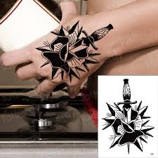 Black rose tattoos represent love and loss of love or even a memorial. Hand Tattoo Rose Knife Mens Fake Tattoo Black Henna Stickers For Hand Rose Tattoo Indian Halloween Waterproof Tatoo Finger Decal Temporary Tattoos Aliexpress