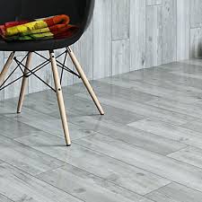 This mesmerizing tile pattern is sure to liven up your space and give it a modern spin. Damaso Grey Matt Wood Effect Porcelain Wall Floor Tile Pack Of 8 L 900mm W 150mm Diy At B Q