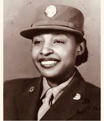 Durham NC photo of friends during WW II. My mother, Olivia Clements Weaver,  is far left front row. She was born in the Hayti district in 1926 and  worked at NC Mutual