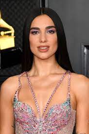She was nominated for six grammys and was both, an attendee and a performer at the event. Dua Lipa Wore A Sparkling Pink Naked Dress To The 2021 Grammys