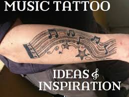 Beautiful music tattoo on nape. Musical Tattoo Ideas Music Notes Instruments Bands Tatring