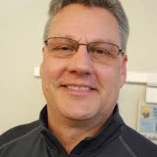 Henley picks new football coach