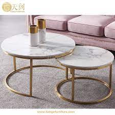 Form meets function as the lower shelf is stylishly raised to offer additional storage. New Design Granite Marble Top Brass Elle Round Nest Coffee Table Buy Brass Coffee Table Brass Coffee Table Brass Table Product On Alibaba Com