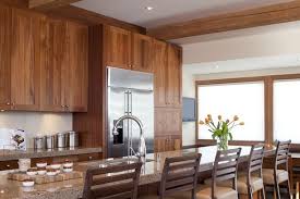Armoires De Cuisine De Style Contemporain L Ilot Et La Totalite De La Cuisine Ont Ete Realise En Acajou Africain Naturel Dream Kitchen Kitchen Reno Kitchen