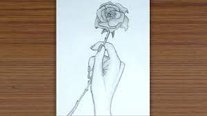 See more ideas about how to draw hands, drawing tutorial, drawings. How To Draw A Hand Holding Rose Flower Pencil Sketch Drawing Youtube