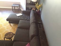 I love it when a modernly you would have to put these shelves up somewhere near a sofa or chairs like in this example. Follow Up Diy Behind The Couch Shelf Directions Keeps On Ringing