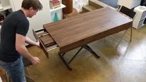 The extendable coffee tables features valuable purpose, it needs to accommodate cups of coffee, magazines, newspapers, books, food, drink, and media players. Span Coffee Transformer Table Height Adjustable And Extendable Youtube
