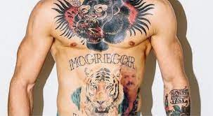 The former trail blazers big man is coming off 24 hours straight of streaming on espn esports'. Photo Joe Exotic Conor Mcgregor Tattoo
