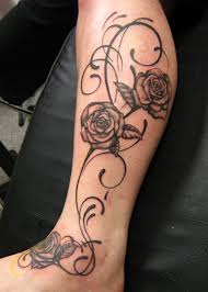 Black tribal and red rose tattoo on half sleeve. Black Rose Tattoo Designs For Women