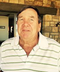 What is the correct procedure for a ball embedded in a lateral hazard?