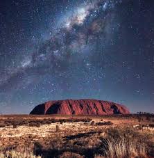 Uluru At Dusk Part Of The Darwin To Adelaide Road Trip Through Central Australia For Campervan Travelers On A Budget Where Y Australia Travel Australia Travel