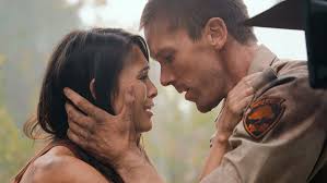 Romance in the Wilds' (2021): Lovers unite over wildfire, wild animals, &  explosions