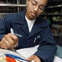 Aviation Structural Mechanic Equipment Airman Kimberly Leonard, from Fort  Lauderdale, Fla., looks at military uniforms in the Navy Marine Corps  Relief Society (NMCRS) Thrift Store.