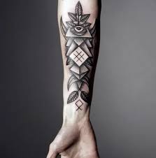 Black tribal design tattoo on man right full arm. 15 Awesome Forearm Tattoo Designs Ideas For Men And Women