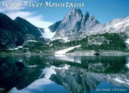 Visitors enjoy fishing in the . Wind River Mountain Range Hiking Wyoming