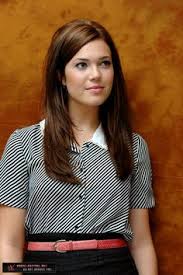 Moore poses with her platinum blonde hair wearing an oversized comfy sweater. 92 Mandy Moore Ideas Mandy Moore Mandy Moore Hair Hair Styles