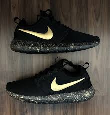 All black nike shoes with white swoosh. Nike Roshe Run Black With Custom Gold Swoosh And Splatter Sole Etsy Tennis Shoes Outfit Nike Roshe Run Black Nike Sneakers Women