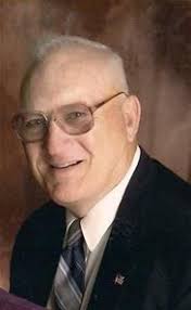 John Elvin Holmes Obituary