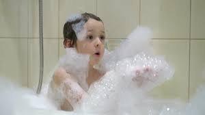 While it's not desirable for children to drink bathwater, the amount of soap that is usually diluted into a large amount of water in the bathtub is probably not enough to cause a medical emergency, even in a bubble bath. Adorable Bath Baby Girl With Stock Footage Video 100 Royalty Free 1028869775 Shutterstock