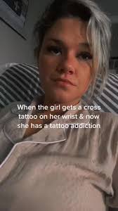 Youtuber with Cross Tattoo